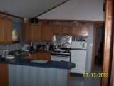 Kitchen with oak cabinets